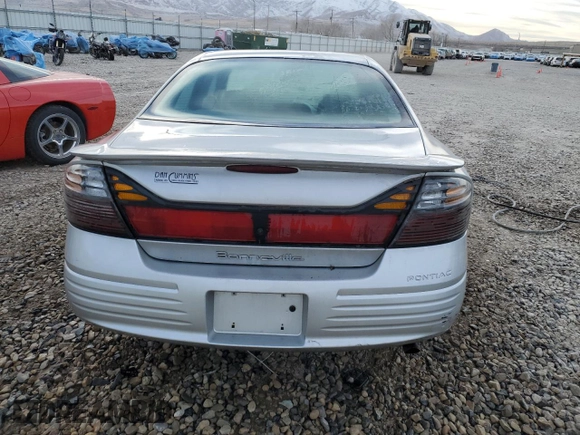 2003 Pontiac Bonneville SE z VIN 1G2HX52K534102213, wystawiony jako Copart lot #41921295 z przebiegiem 136 422 mil mil oraz Szkoda całkowita • Salvage title. Historia ofert i sprzedaży dostępna na DreamBid. Obrazek 6.