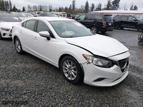 2016 Mazda Mazda6 i Sport with VIN JM1GJ1U52G1431967, listed as a IAAI auction lot 41602804 with 130,579 mi miles. Bid and sale history available at carsss.com. Image 1.