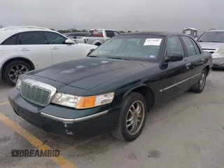 2002 Mercury Grand Marquis LS Premium z VIN 2MEFM75WX2X626520, wystawiony jako IAAI lot #42374203 z przebiegiem 139 692 mil mil oraz . Historia ofert i sprzedaży dostępna na DreamBid. Obrazek 2.