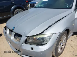 2009 BMW 3 Series 328i with VIN WBAPH77599NM30026, listed as a IAAI auction lot 41790508 with 129,498 mi miles. Bid and sale history available at carsss.com. Image 13.