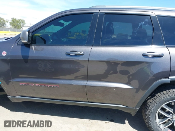 2017 Jeep Grand Cherokee Trailhawk with VIN 1C4RJFLG3HC877110, listed as a IAAI auction lot 42276506 with 144,993 mi miles and . Bid and sale history available at DreamBid. Image 15.