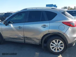 2013 Mazda CX-5 Touring with VIN JM3KE2CE3D0123138, listed as a IAAI auction lot 41818678 with 173,909 mi miles. Bid and sale history available at carsss.com. Image 14.