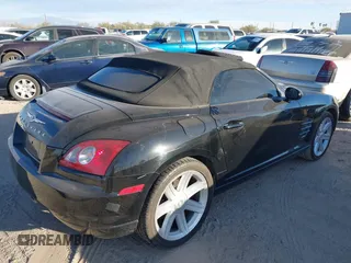 2005 Chrysler Crossfire with VIN 1C3AN55L55X051986, listed as a IAAI auction lot 41288735 with 97,853 mi miles and . Bid and sale history available at DreamBid. Image 4.