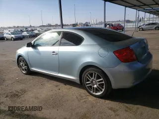 2007 Scion tC Spec with VIN JTKDE177570202301, listed as a Copart auction lot 83015074 with 184,108 mi miles and Salvage Title. Bid and sale history available at carsss.com. Image 2.