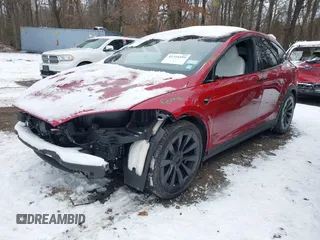 2023 Tesla Model X with VIN 7SAXCBE51PF404297, listed as a IAAI auction lot 41314595 with 25,020 mi miles and . Bid and sale history available at DreamBid. Image 6.