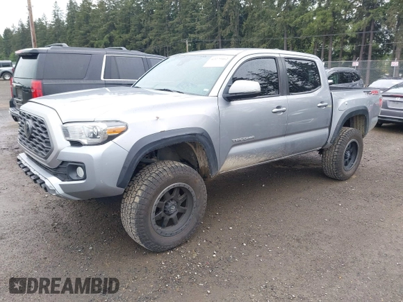 2020 Toyota Tacoma SR5 z VIN 3TMCZ5AN8LM323918, wystawiony jako IAAI lot #42279462 z przebiegiem 105 923 mil mil oraz . Historia ofert i sprzedaży dostępna na DreamBid. Obrazek 20.