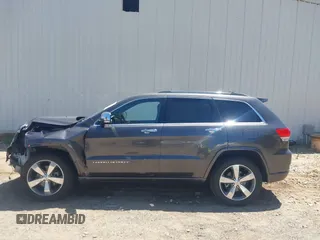 2015 Jeep Grand Cherokee Overland with VIN 1C4RJFCG7FC839778, listed as a IAAI auction lot 42490111 with 160,040 mi miles and . Bid and sale history available at DreamBid. Image 15.