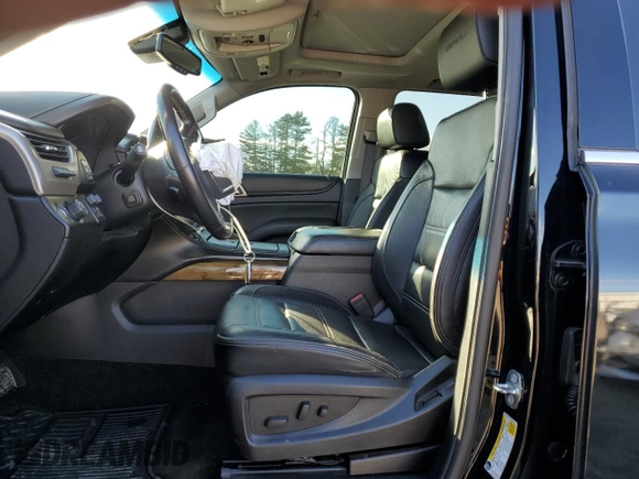 2016 GMC Yukon Denali with VIN 1GKS1CKJXGR329103, listed as a Copart auction lot 75492494 with 124,374 mi miles and Salvage Title. Bid and sale history available at carsss.com. Image 7.