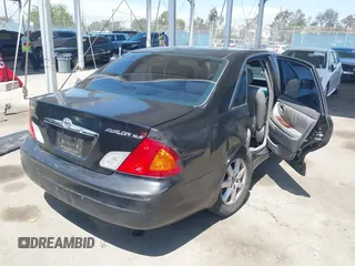 2000 Toyota Avalon XL with VIN 4T1BF28BXYU105640, listed as a IAAI auction lot 42024346 with 317,895 mi miles and . Bid and sale history available at DreamBid. Image 4.