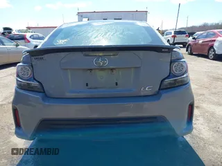 2014 Scion tC with VIN JTKJF5C70E3083839, listed as a IAAI auction lot 41886711 with 118,029 mi miles. Bid and sale history available at carsss.com. Image 16.