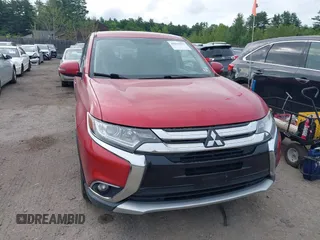 2017 Mitsubishi Outlander SE z VIN JA4AZ3A3XHZ059420, wystawiony jako IAAI lot #42611077 z przebiegiem 130 406 mil mil oraz . Historia ofert i sprzedaży dostępna na DreamBid. Obrazek 12.