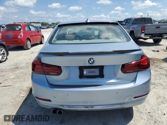 2013 BMW 3 Series 328i with VIN WBA3A5G59DNP20265, listed as a Copart auction lot 61650995 with 221,317 mi miles and Clean title. Bid and sale history available at DreamBid. Image 6.