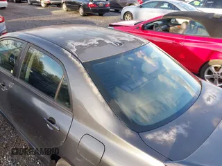2009 Toyota Corolla with VIN 2T1BU40E99C118163, listed as a IAAI auction lot 41109184 with 194,960 mi miles. Bid and sale history available at carsss.com. Image 17.