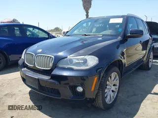 2013 BMW X5 xDrive50i with VIN 5UXZV8C5XD0C15908, listed as a IAAI auction lot 42536233 with 190,627 mi miles and . Bid and sale history available at DreamBid. Image 2.