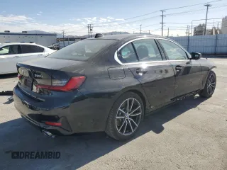 2019 BMW 3 Series 330i with VIN 3MW5R1J53K8A05694, listed as a Copart auction lot 47048555 with 13,629 mi miles and Salvage Title. Bid and sale history available at carsss.com. Image 3.