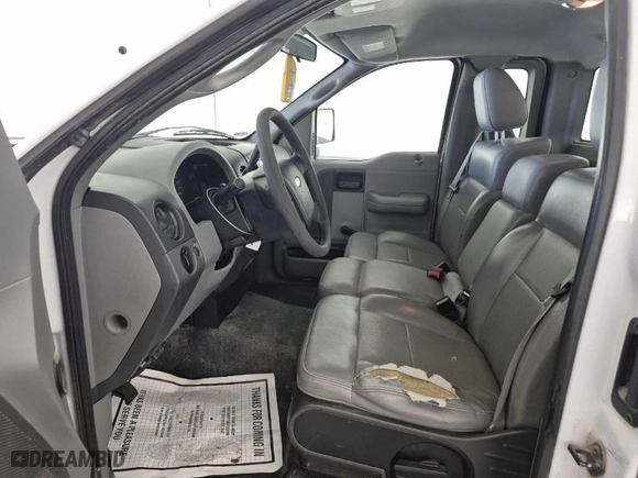 2006 Ford F-150 XL with VIN 1FTRF12206KC79621, listed as a IAAI auction lot 42088195 with 43,746 mi miles. Bid and sale history available at carsss.com. Image 1.