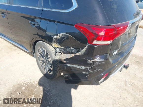 2018 Mitsubishi Outlander SEL with VIN JA4J24A56JZ031678, listed as a IAAI auction lot 38897134 with 146,701 mi miles and . Bid and sale history available at DreamBid. Image 6.