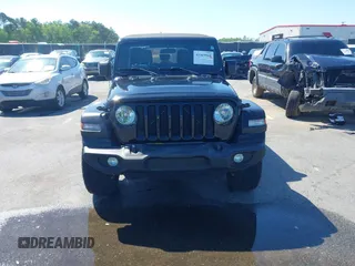 2018 Jeep Wrangler Unlimited Sport with VIN 1C4HJXDN3JW198375, listed as a IAAI auction lot 41965568 with 106,418 mi miles and . Bid and sale history available at DreamBid. Image 12.