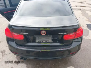 2015 BMW 3 Series 328i with VIN WBA3A5G56FNS83991, listed as a IAAI auction lot 41123406 with 146,818 mi miles. Bid and sale history available at carsss.com. Image 16.