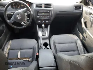 2012 Volkswagen Jetta SE with VIN 3VWDX7AJ0CM314940, listed as a Copart auction lot 61930085 with 221,356 mi miles and Salvage title. Bid and sale history available at DreamBid. Image 8.