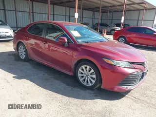 2019 Toyota Camry LE with VIN 4T1B11HK4KU725075, listed as a IAAI auction lot 41781275 with 156,856 mi miles and . Bid and sale history available at DreamBid. Image 1.