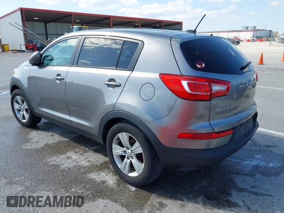 2013 Kia Sportage LX with VIN KNDPB3A24D7365157, listed as a IAAI auction lot 41968652 with 137,055 mi miles and . Bid and sale history available at DreamBid. Image 3.