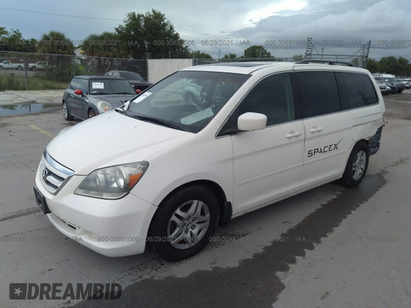 2006 Honda Odyssey EX-L with VIN 5FNRL38756B084148, listed as a IAAI auction lot 41694915 with 164,915 mi miles. Bid and sale history available at carsss.com. Image 2.