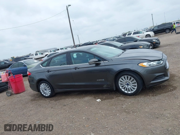 2016 Ford Fusion SE Hybrid with VIN 3FA6P0LU5GR235241, listed as a IAAI auction lot 41697504 with 165,510 mi miles. Bid and sale history available at carsss.com. Image 13.