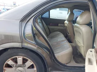 2004 Lincoln LS with VIN 1LNHM87A04Y671711, listed as a IAAI auction lot 41606121 with 1 mi miles. Bid and sale history available at carsss.com. Image 8.