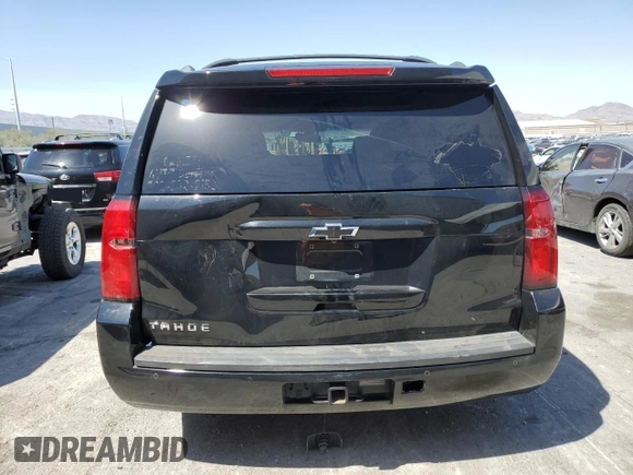 2017 Chevrolet Tahoe LS with VIN 1GNSCAKC5HR115494, listed as a Copart auction lot 54710295 with 138,899 mi miles and Salvage title. Bid and sale history available at DreamBid. Image 6.