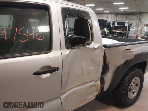 2013 Toyota Tacoma with VIN 5TFUU4EN0DX071116, listed as a IAAI auction lot 41647546 with 243,898 mi miles and . Bid and sale history available at DreamBid. Image 6.