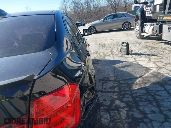 2015 BMW 3 Series 328i with VIN WBA3C1C53FK120984, listed as a IAAI auction lot 41338035 with 119,486 mi miles and . Bid and sale history available at carsss.com. Image 17.