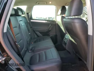 2014 Volkswagen Touareg Lux z VIN WVGEF9BP5ED003068, wystawiony jako Copart lot #82907984 z przebiegiem 127 347 mil mil oraz Czysty tytuł • Clean title. Historia ofert i sprzedaży dostępna na DreamBid. Obrazek 11.