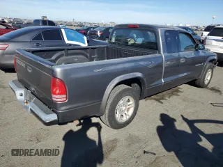 2002 Dodge Dakota with VIN 1B7GL12X02S577219, listed as a Copart auction lot 77067374 with 181,351 mi miles and Salvage Title. Bid and sale history available at carsss.com. Image 3.