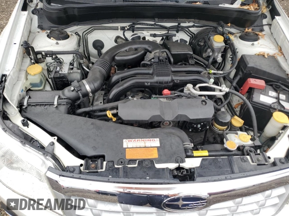 2011 Subaru Forester with VIN JF2SHBHC2BH719557, listed as a Copart auction lot 78809654 with 91,325 mi miles and Salvage title. Bid and sale history available at DreamBid. Image 12.