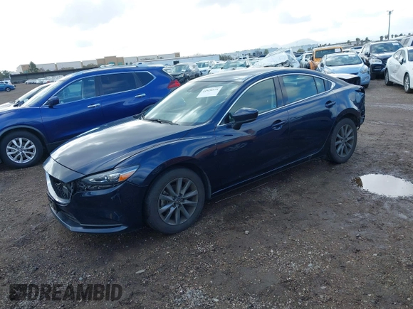 2020 Mazda 6 Sport with VIN JM1GL1UM5L1519519, listed as a IAAI auction lot 41920571 with 59,378 mi miles and . Bid and sale history available at DreamBid. Image 18.