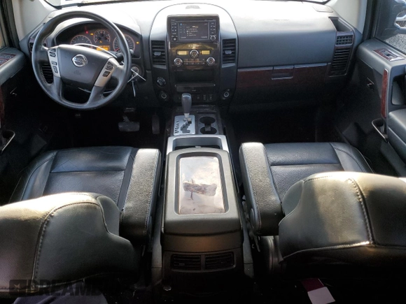 2014 Nissan Titan S with VIN 1N6AA0EC7EN503648, listed as a Copart auction lot 86517824 with 82,556 mi miles and Salvage Title. Bid and sale history available at DreamBid. Image 8.