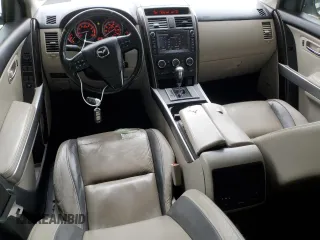 2012 Mazda CX-9 Grand Touring with VIN JM3TB3DV2C0336355, listed as a Copart auction lot 61687975 with 150,580 mi miles and Salvage title. Bid and sale history available at DreamBid. Image 8.