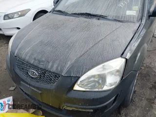 2009 Kia Rio LX with VIN KNADE243296481394, listed as a IAAI auction lot 41498863 with 59,222 mi miles. Bid and sale history available at carsss.com. Image 6.