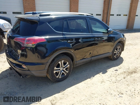 2016 Toyota RAV4 LE with VIN 2T3ZFREV1GW274702, listed as a IAAI auction lot 42058167 with 150,080 mi miles. Bid and sale history available at carsss.com. Image 4.