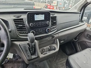 2021 Ford Transit Cargo with VIN 1FTBR1Y82MKA76523, listed as a IAAI auction lot 42679221 with 39,449 mi miles and . Bid and sale history available at DreamBid. Image 8.