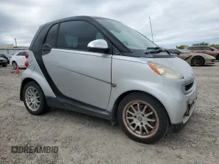 2011 Smart fortwo Pure with VIN WMEEJ3BA5BK438144, listed as a Copart auction lot 51934465 with 135,584 mi miles and Salvage title. Bid and sale history available at DreamBid. Image 4.