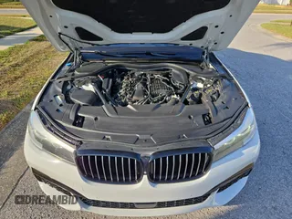 2017 BMW 7 Series 740i with VIN WBA7E2C54HG740427, listed as a Copart auction lot 54992345 with 93,252 mi miles and Clean Title. Bid and sale history available at carsss.com. Image 7.