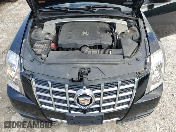 2012 Cadillac CTS z VIN 1G6DC5E50C0122911, wystawiony jako Copart lot #56625855 z przebiegiem 113 600 mil mil oraz Szkoda całkowita • Salvage title. Historia ofert i sprzedaży dostępna na DreamBid. Obrazek 11.