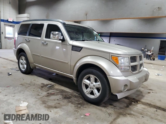 2010 Dodge Nitro SXT with VIN 1D4PU5GK2AW129723, listed as a Copart auction lot 47230535 with 228,701 mi miles and Salvage Title. Bid and sale history available at DreamBid. Image 4.