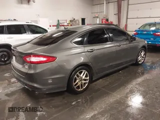 2014 Ford Fusion SE with VIN 3FA6P0H7XER242959, listed as a IAAI auction lot 41162453 with 239,528 mi miles. Bid and sale history available at carsss.com. Image 4.