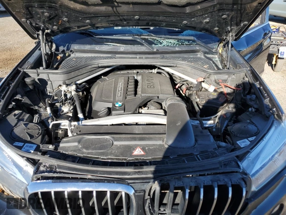 2014 BMW X5 xDrive35i z VIN 5UXKR0C59E0K51868, wystawiony jako Copart lot #79139994 z przebiegiem Nie podano mil oraz Szkoda całkowita • Salvage title. Historia ofert i sprzedaży dostępna na DreamBid. Obrazek 12.