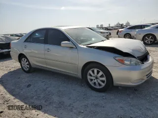 2002 Toyota Camry XLE z VIN 4T1BF32K22U532171, wystawiony jako Copart lot #54527965 z przebiegiem 165 637 mil mil oraz Szkoda całkowita • Salvage title. Historia ofert i sprzedaży dostępna na DreamBid. Obrazek 4.