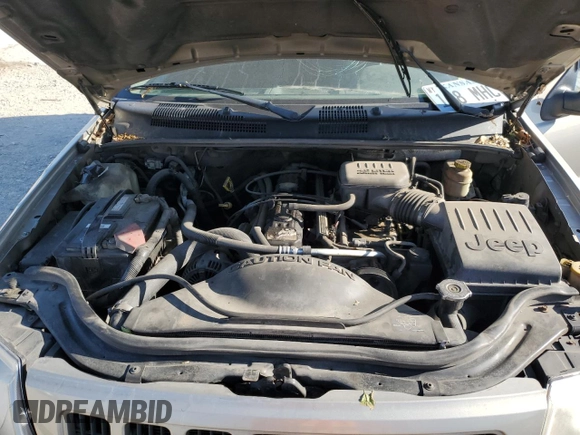 2004 Jeep Grand Cherokee Laredo with VIN 1J4GW48S34C307347, listed as a Copart auction lot 55749565 with Not provided miles and Salvage title. Bid and sale history available at DreamBid. Image 12.