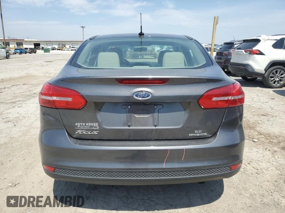 2015 Ford Focus SE with VIN 1FADP3F21FL349981, listed as a Copart auction lot 53460425 with 76,542 mi miles and Salvage title. Bid and sale history available at DreamBid. Image 6.